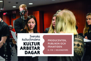 På bilden samtalar flera producenter backstage.